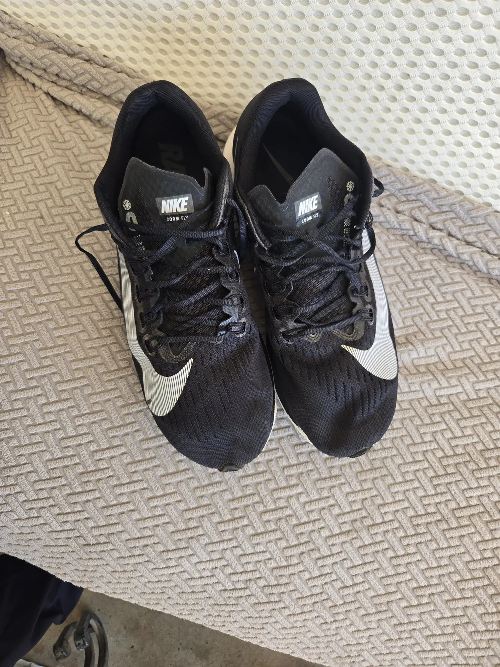 Nike Men’s Black Running Shoes with White Swoosh
